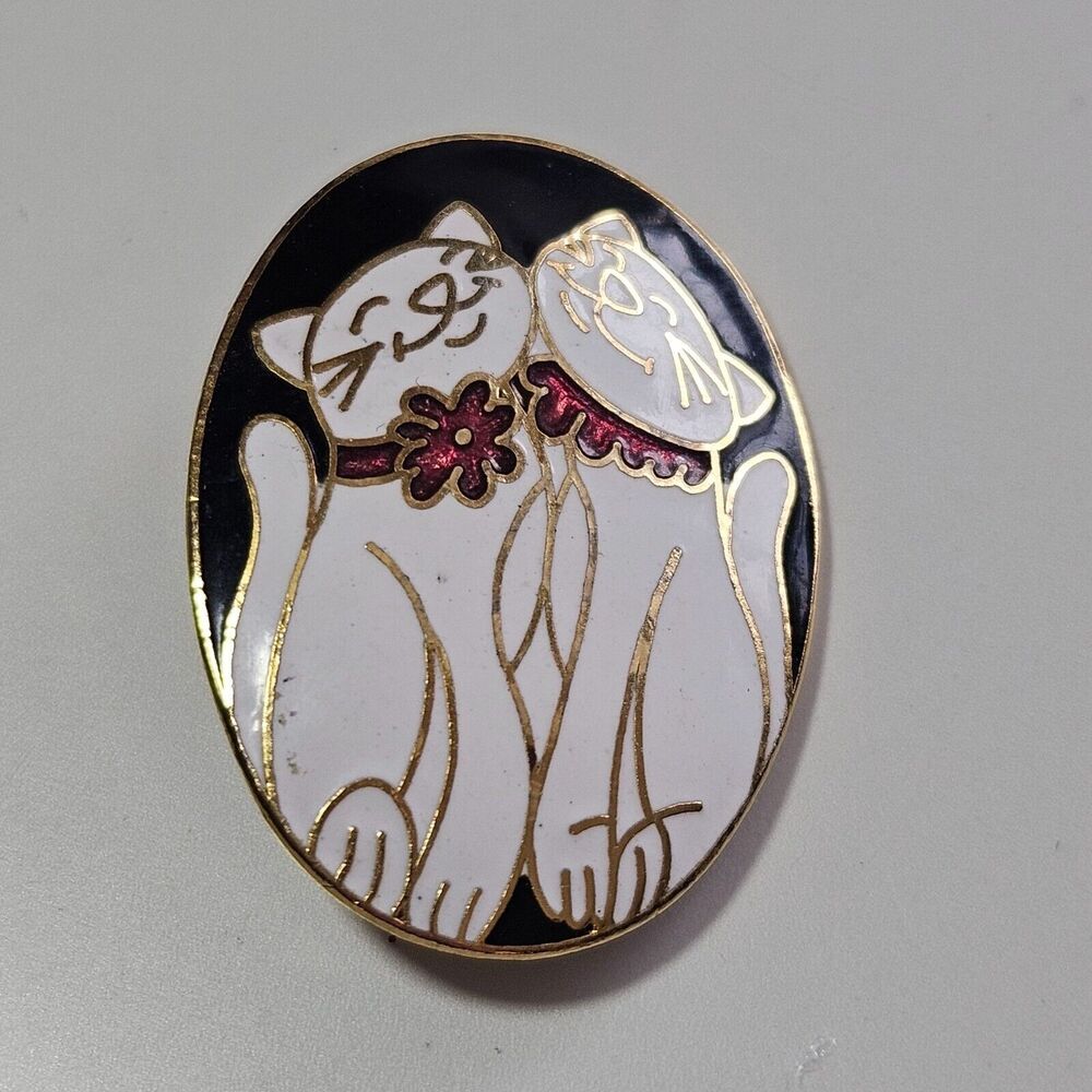 Gold tone black white kitty cat brooch